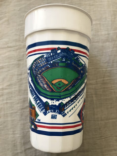 Vintage MLB stadium cup with baseball field graphic, red and blue stripes, collectible memorabilia
