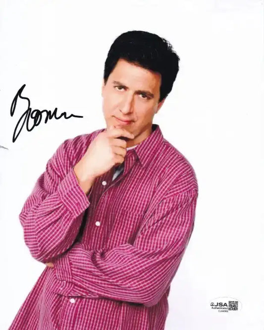 Autographed photo of actor in red plaid shirt, JSA authenticated, ideal for collectors of signed memorabilia