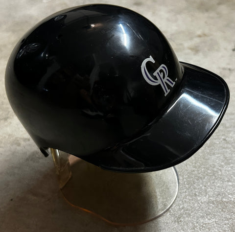 Colorado Rockies Riddell vintage mini batting helmet with stand - AutographsForSale.com