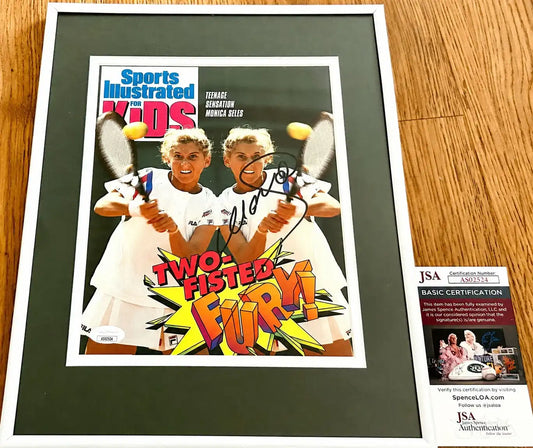 Framed Monica Seles autographed Sports Illustrated for Kids cover with JSA certification, tennis memorabilia