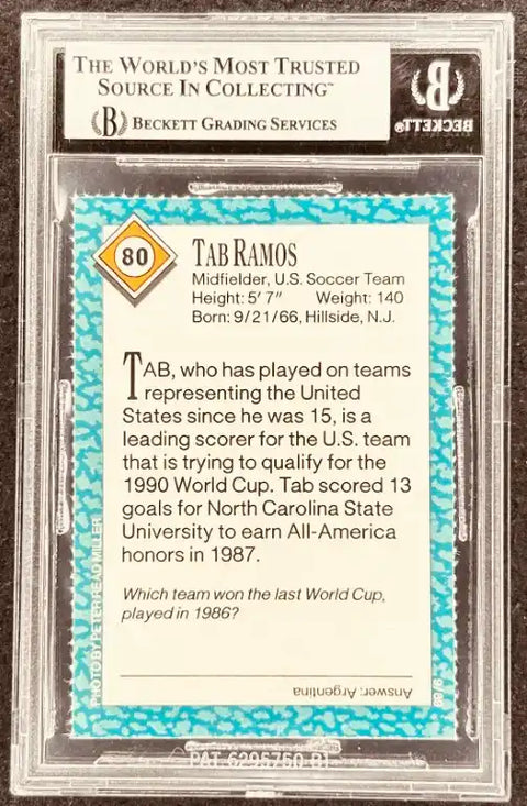 Tab Ramos soccer card, graded by Beckett, featuring U.S. team stats and 1990 World Cup details