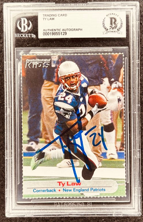 Ty Law signed Patriots 2002 SI for Kids card BAS slab - AutographsForSale.com