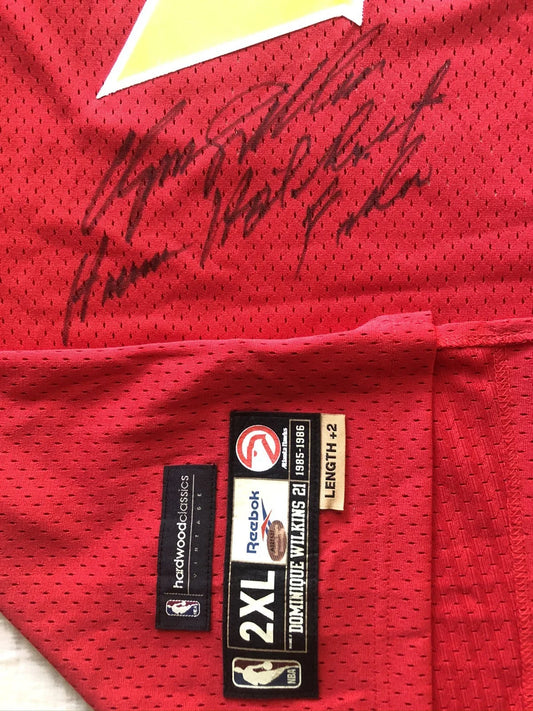 Dominique Wilkins signed Hawks 1985-86 Reebok jersey w/ Human Highlight Film Schwartz - AutographsForSale.com