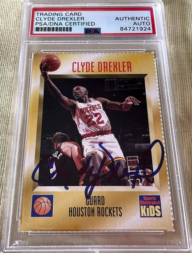 Clyde Drexler autographed Houston Rockets 1995 Sports Illustrated for Kids card PSA/DNA Slabbed - AutographsForSale.com