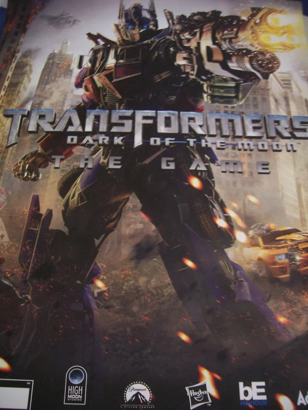 Transformers Dark of Moon 2011 video game 24x28 poster - AutographsForSale.com