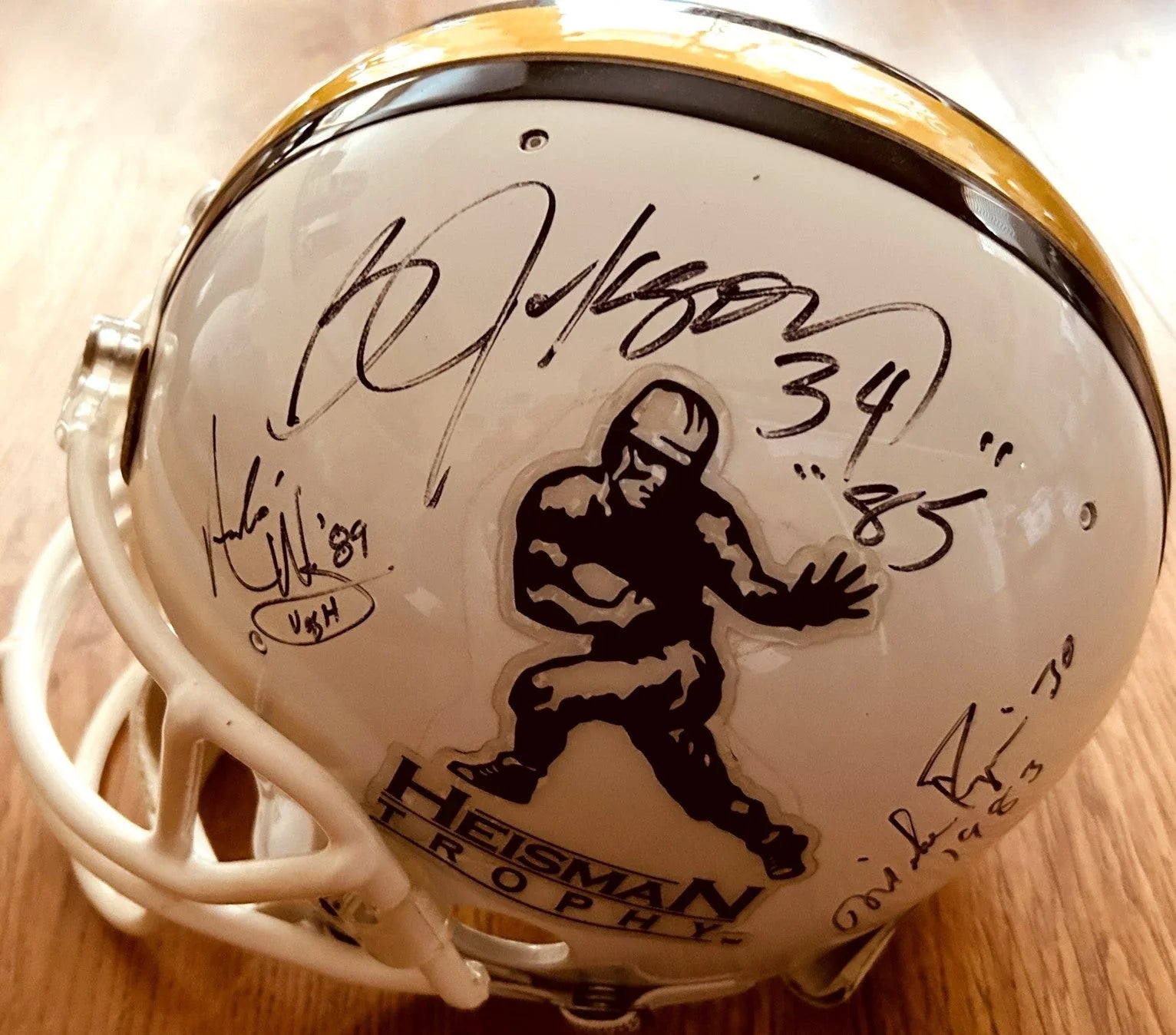 Heisman Trophy Riddell full size helmet signed by 10 winners Bo Jackson Herschel Walker JSA - AutographsForSale.com