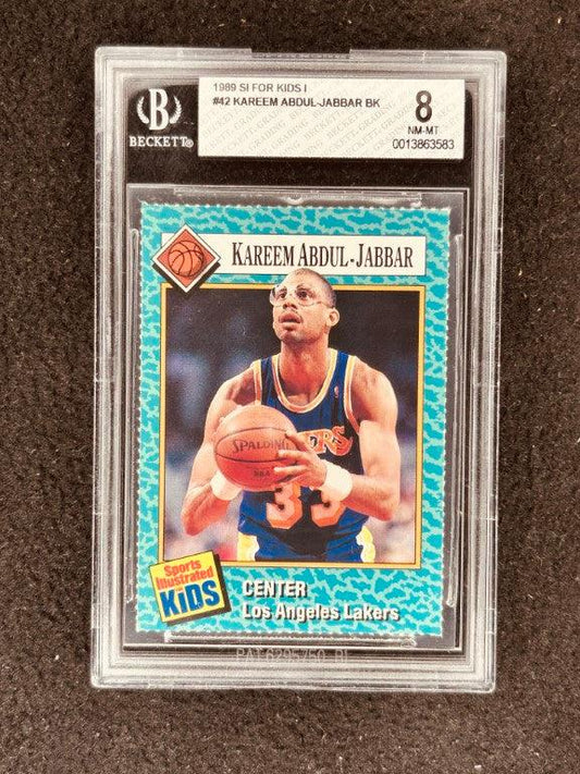 Kareem Abdul-Jabbar Los Angeles Lakers 1989 Sports Illustrated for Kids card BGS 8 - AutographsForSale.com