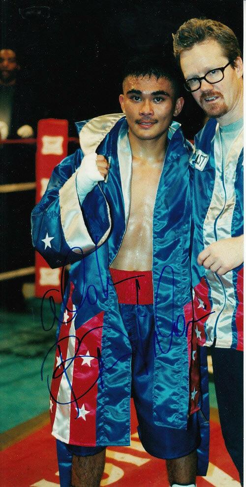 Brian Viloria autographed 5x10 Boxing photo - AutographsForSale.com