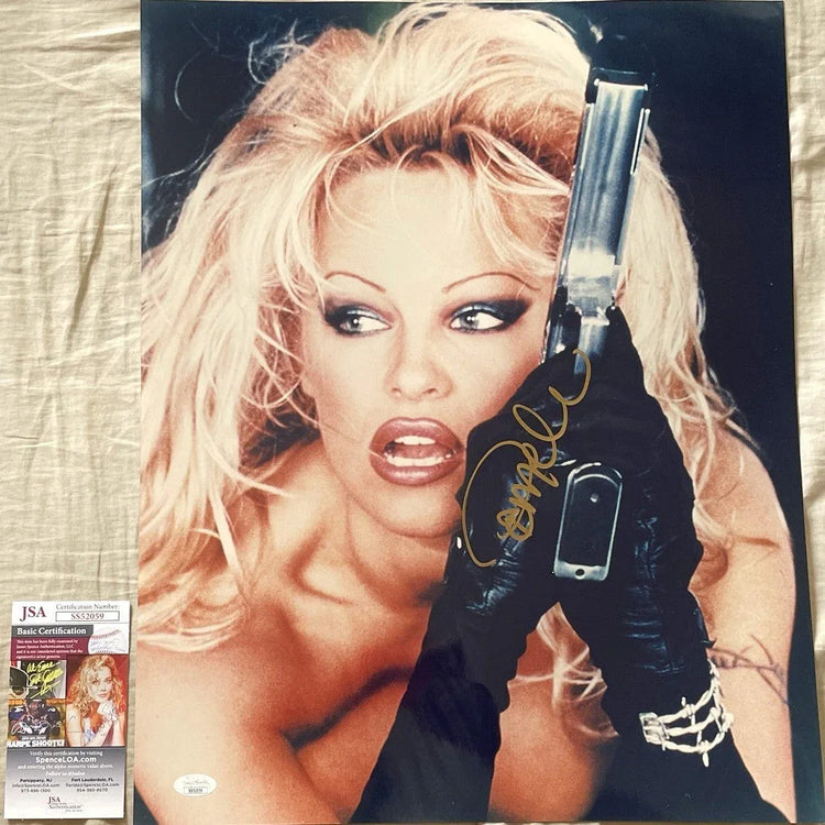 Pamela Anderson autographed Barb Wire 16x20 poster size movie photo JSA - AutographsForSale.com