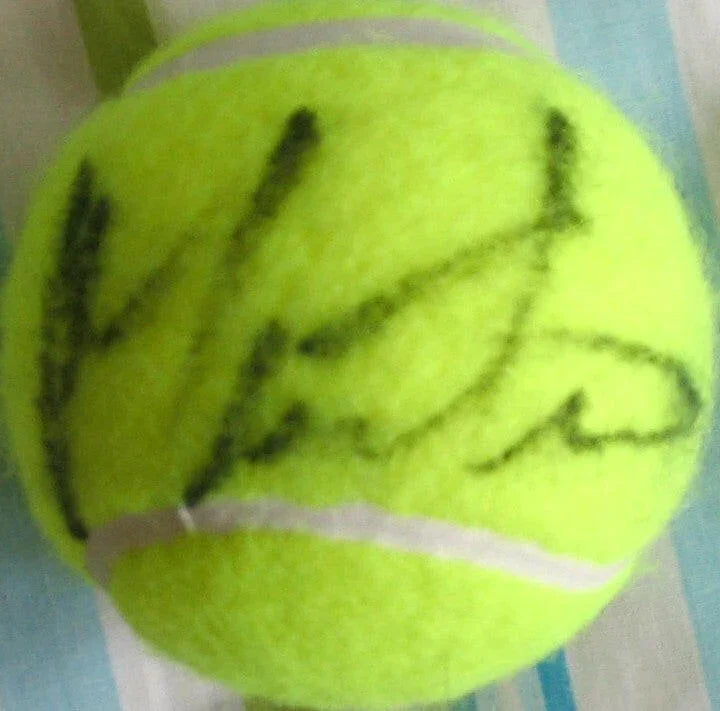 Martina Navratilova autographed tennis ball - AutographsForSale.com