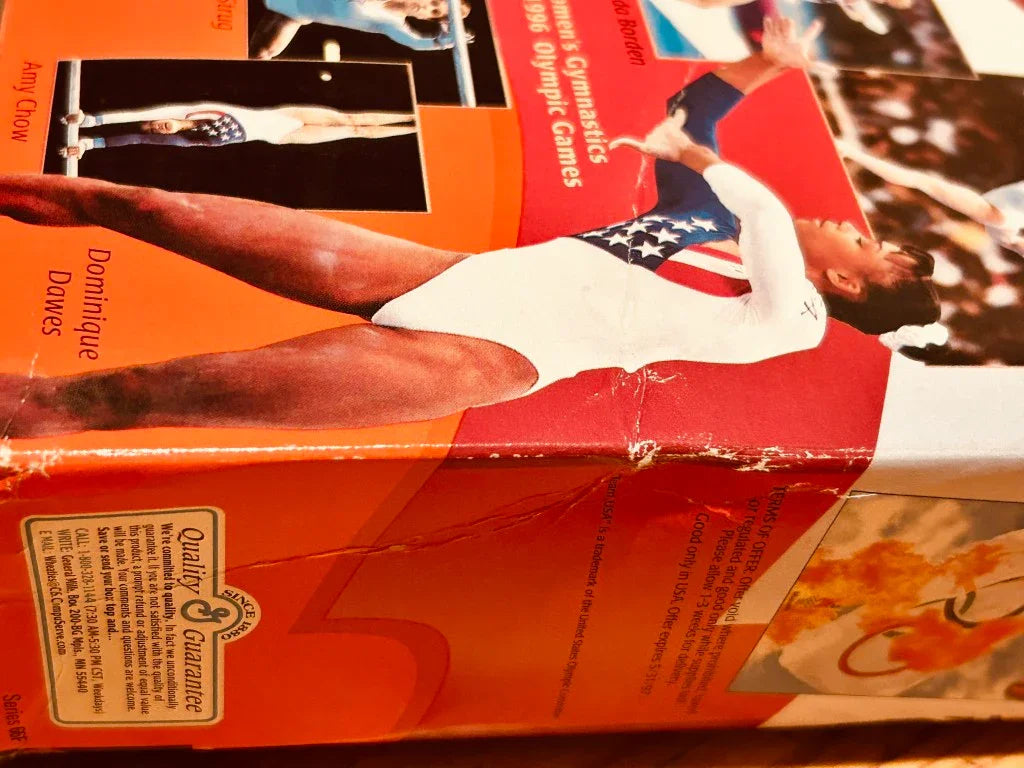 1996 US Olympic Gymnastics Magnificent 7 Gold Medal team signed Wheaties box JSA - AutographsForSale.com