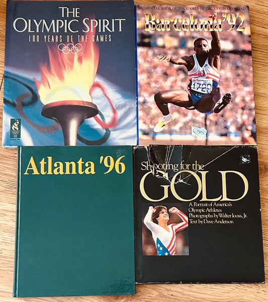 4 Olympic coffee table books 100 Years of the Games Atlanta 96 Barcelona 92 and Shooting for the Gold - AutographsForSale.com