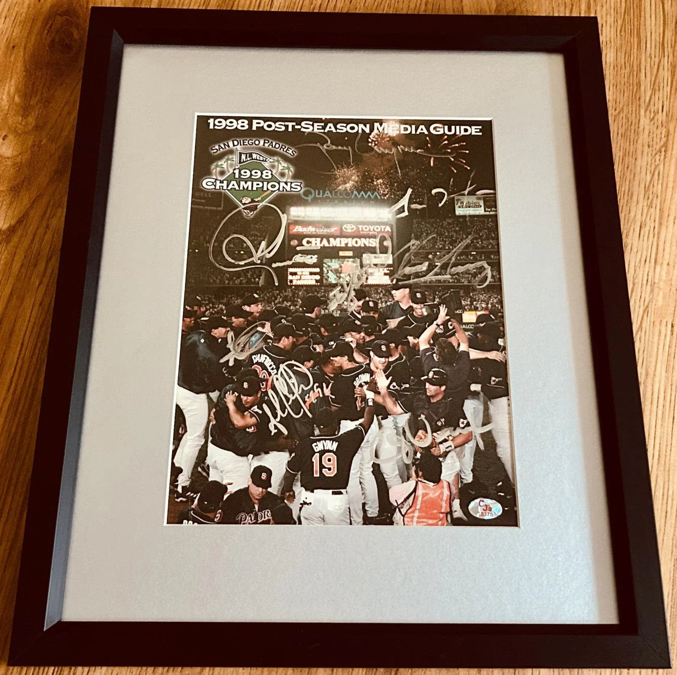 1998 San Diego Padres team autographed Media Guide cover framed JSA Ken Caminiti Tony Gwynn Trevor Hoffman - AutographsForSale.com