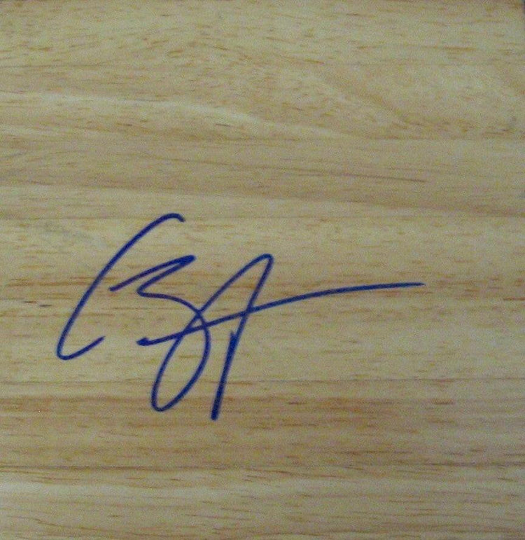 Caron Butler signed basketball wood floor UConn Mavericks Washington Wizards - AutographsForSale.com