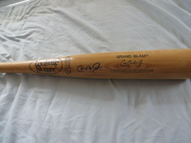 Cal Ripken autographed Baltimore Orioles Louisville Slugger Grand Slam Baseball Bat JSA - AutographsForSale.com