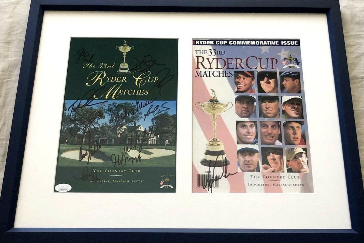 1999 US Ryder Cup team signed program covers framed JSA Tiger Woods - AutographsForSale.com