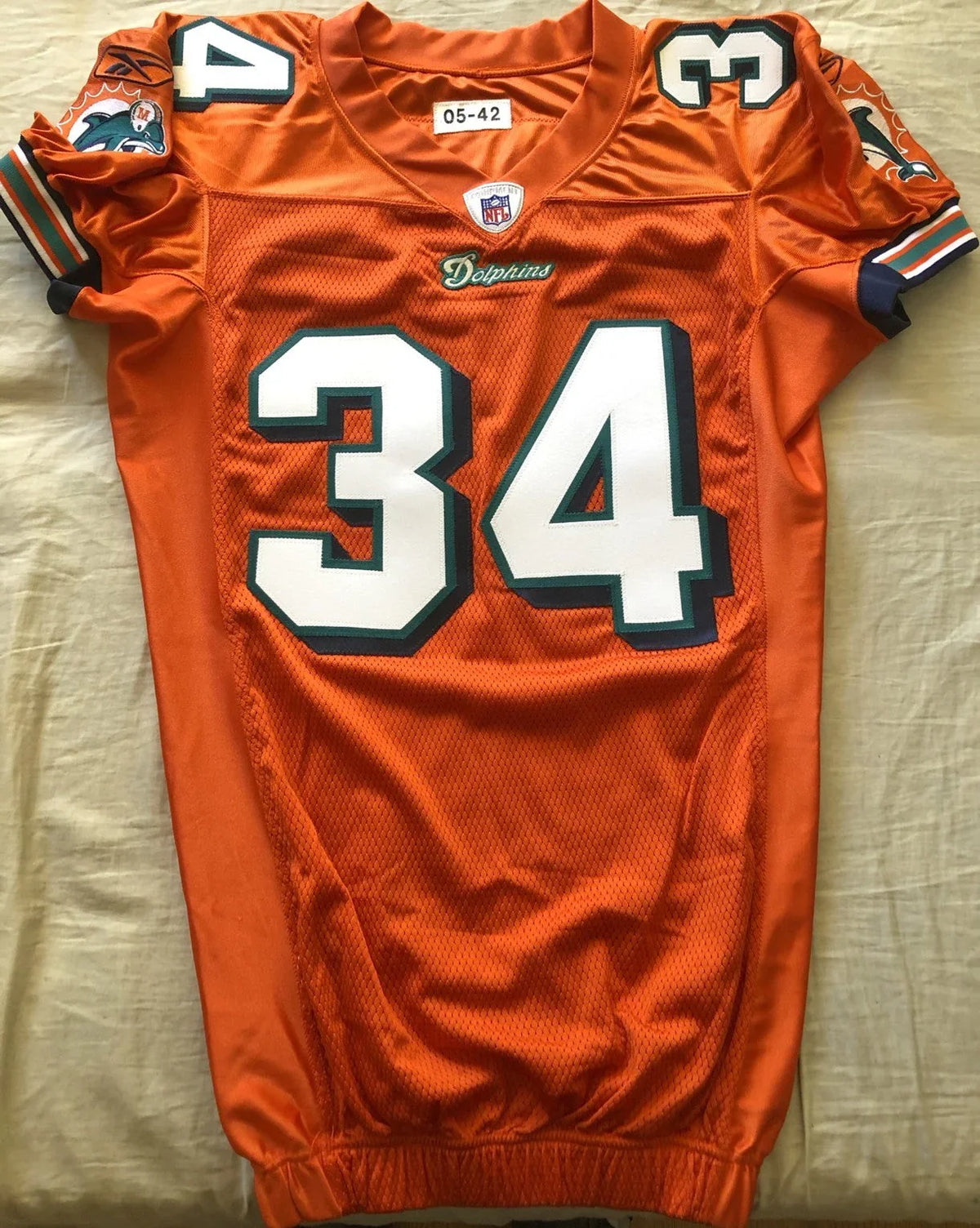 Ricky Williams Miami Dolphins 2005 authentic Reebok team issued orange stitched jersey - AutographsForSale.com