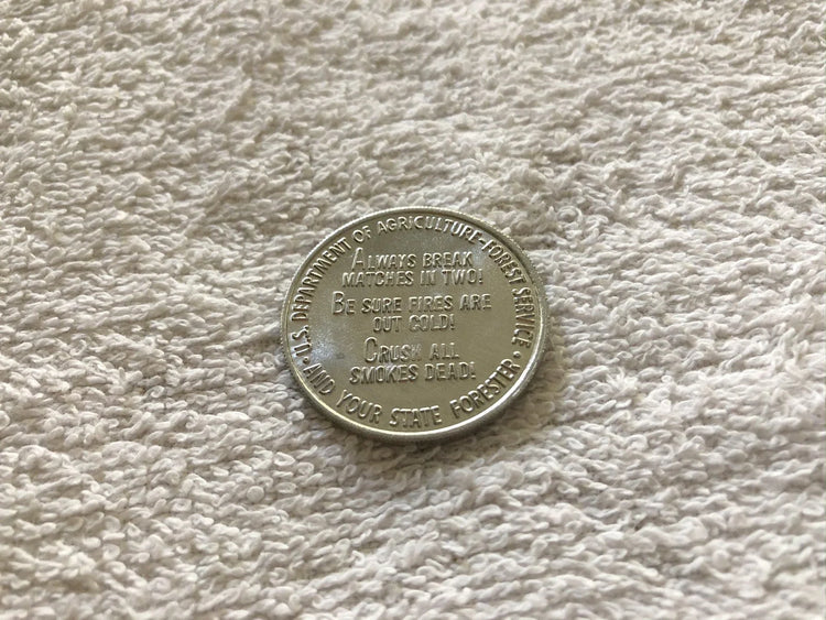 Smokey the Bear vintage 1960s aluminum coin - AutographsForSale.com