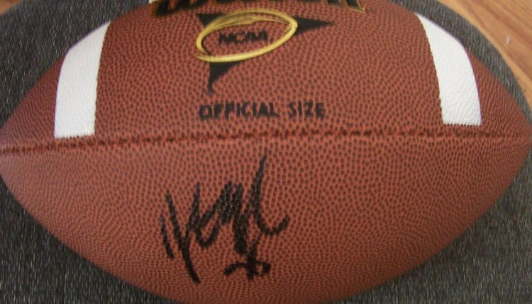 Jonathan Ogden autographed Wilson NCAA football Ravens UCLA - AutographsForSale.com