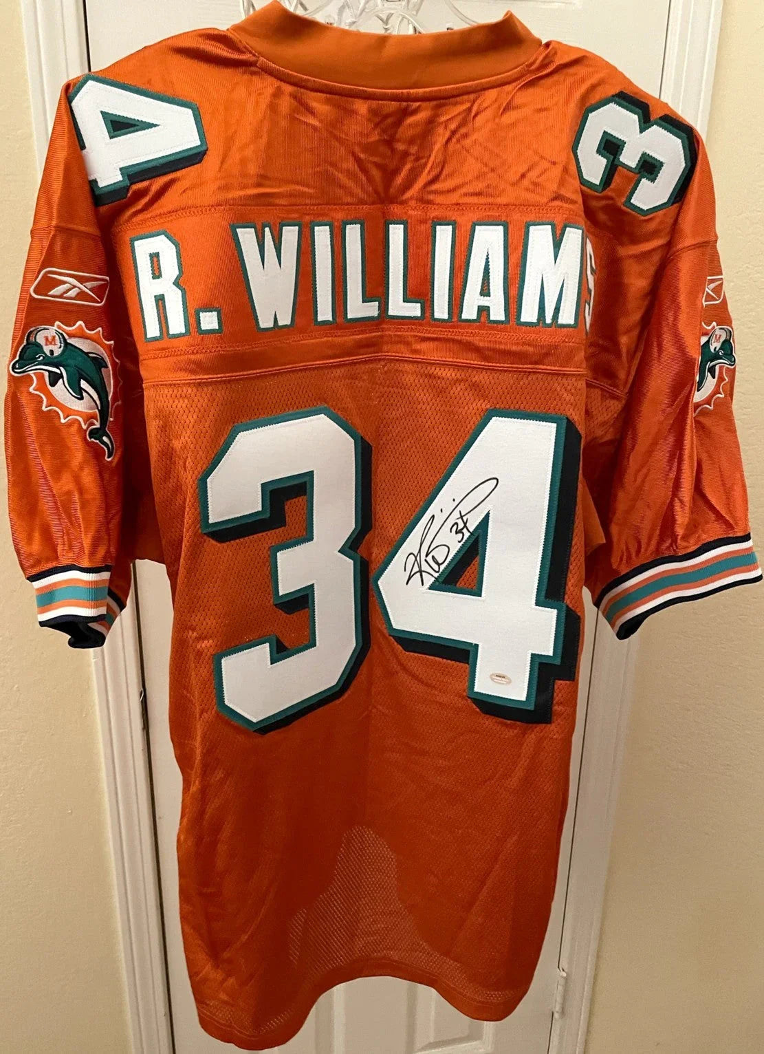 Ricky Williams signed Dolphins Reebok game model orange jersey SCHWARTZ - AutographsForSale.com