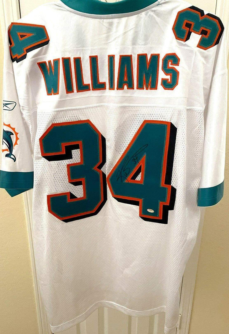 Ricky Williams signed Dolphins Reebok white jersey SCHWARTZ - AutographsForSale.com