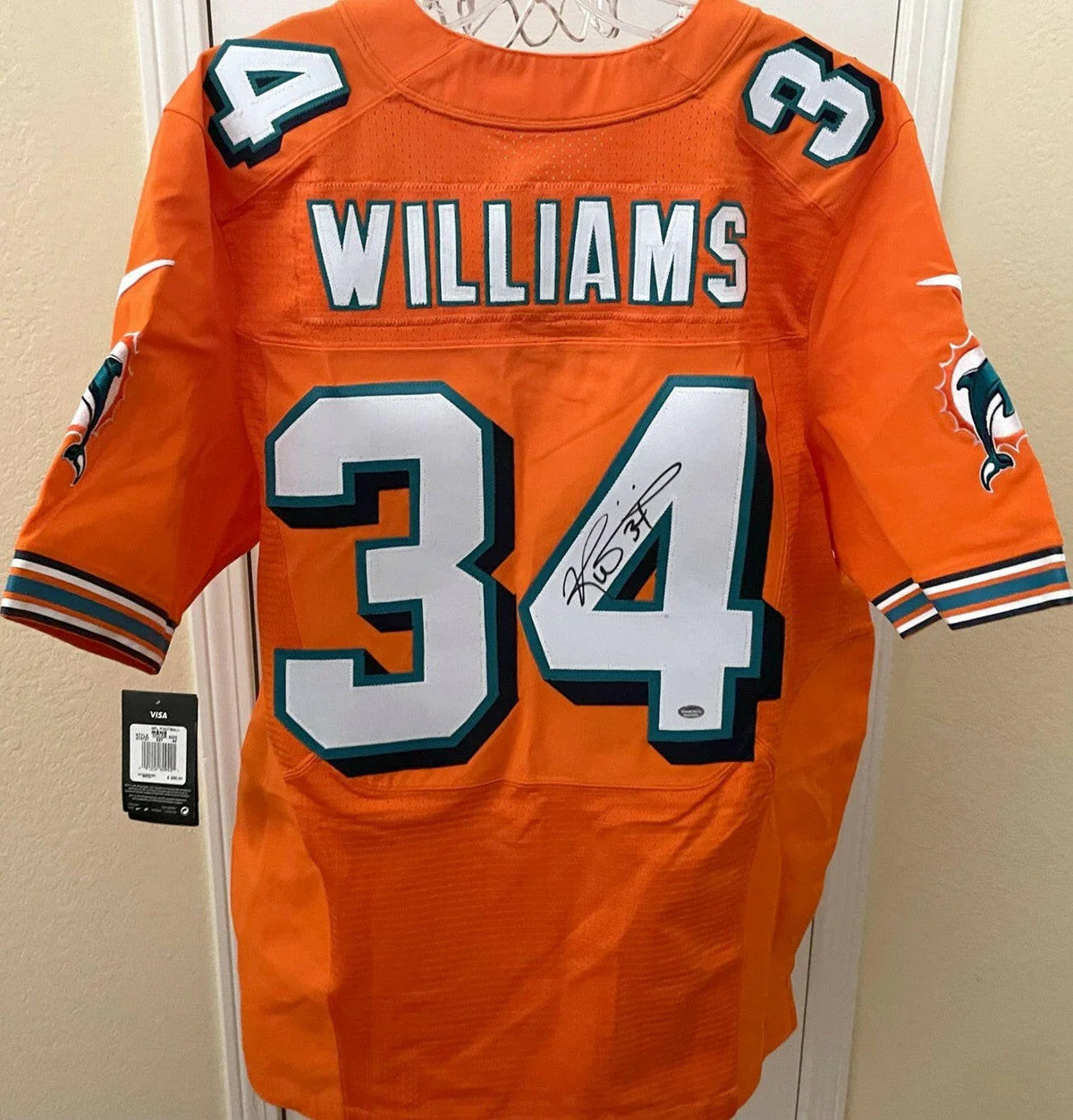 Ricky Williams signed Dolphins Nike Elite orange game model jersey SCHWARTZ - AutographsForSale.com