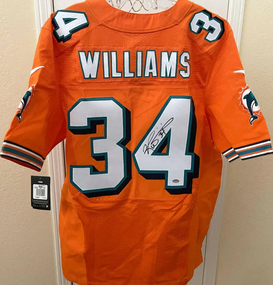 Ricky Williams signed Dolphins Nike Elite orange game model jersey SCHWARTZ - AutographsForSale.com