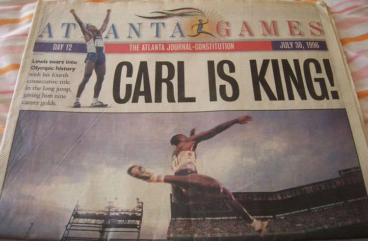 Carl Lewis is King 1996 Olympic Games Atlanta Journal-Constitution newspaper - AutographsForSale.com