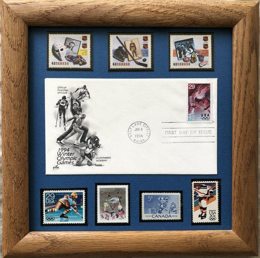 1994 Winter Olympics First Day Cover with 7 Canada and USA Hockey stamps framed - AutographsForSale.com