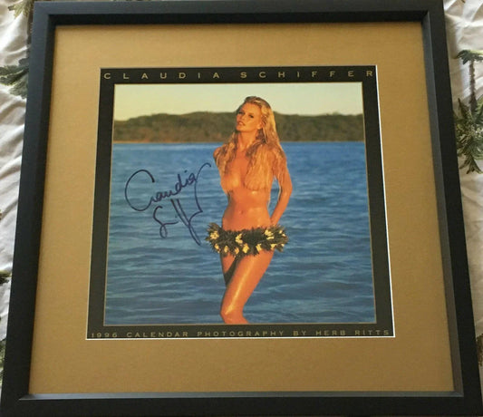 Claudia Schiffer signed 1996 Herb Ritts swimsuit calendar cover framed JSA - AutographsForSale.com