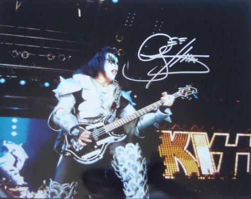 Gene Simmons signed KISS 11x14 concert photo (Real Deal Memorabilia) - AutographsForSale.com