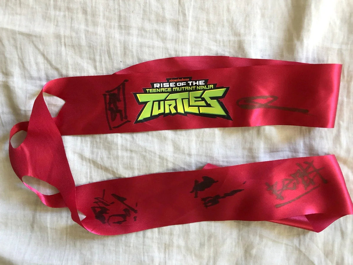 Rise of the Teenage Mutant Ninja Turtles cast autographed 2018 Comic-Con red eye mask headband - AutographsForSale.com