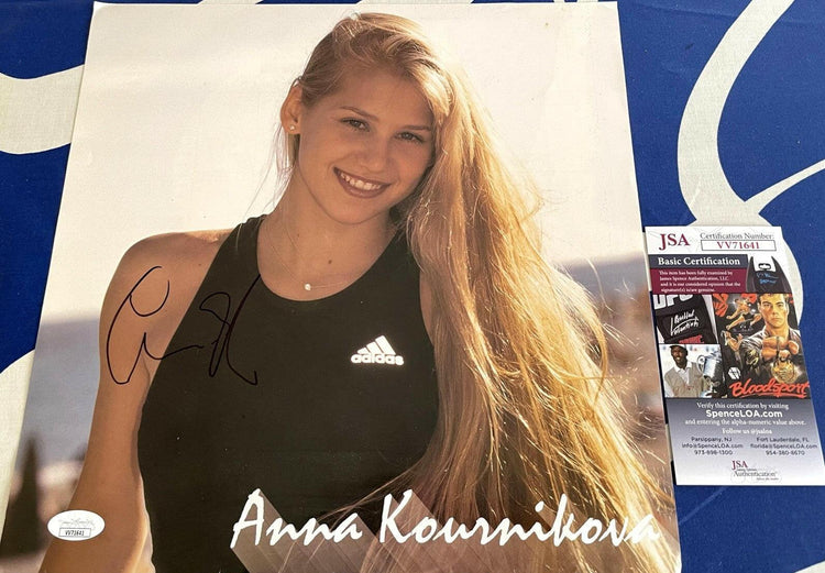 Anna Kournikova autographed 1999 WTA Tour Tennis calendar page photo JSA - AutographsForSale.com