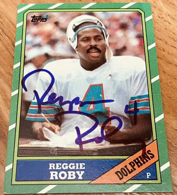 Reggie Roby autographed Miami Dolphins 1986 Topps card - AutographsForSale.com
