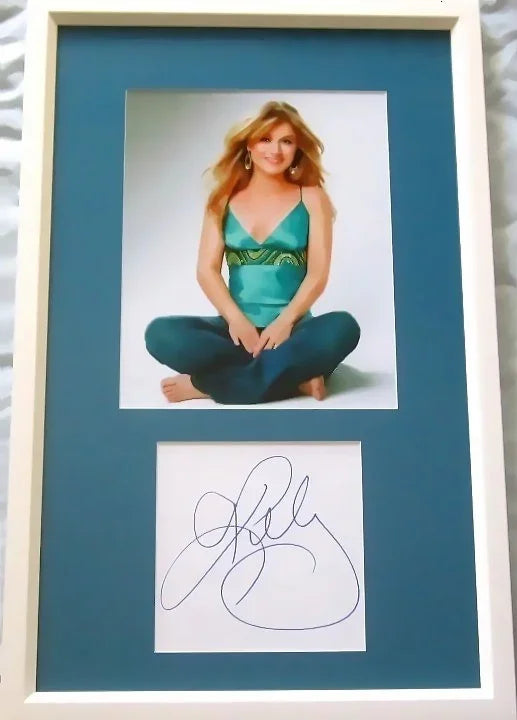 Kelly Clarkson autograph framed vintage 8x10 photo JSA - AutographsForSale.com