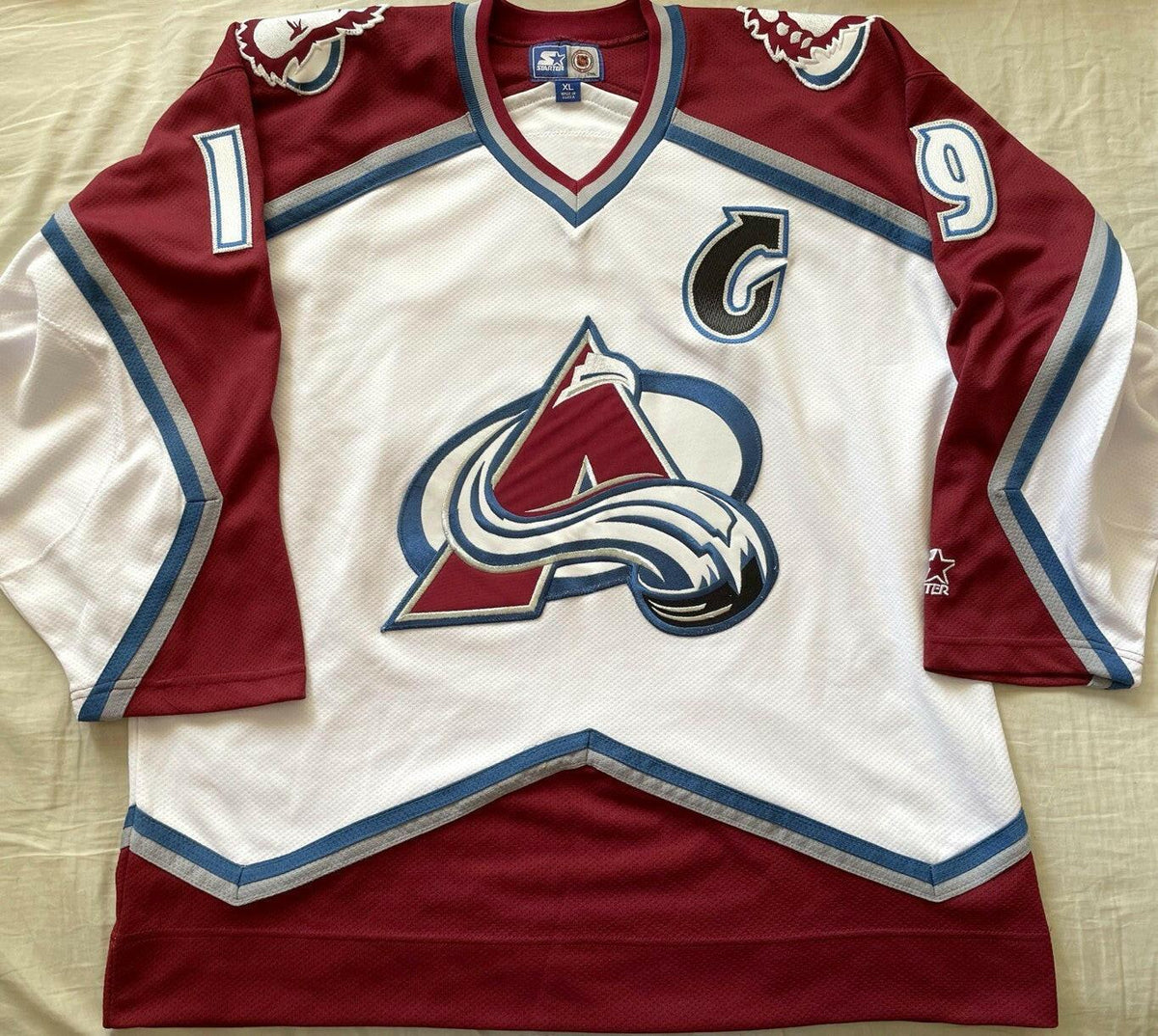 Joe Sakic Colorado Avalanche 1990s Starter white jersey - AutographsForSale.com