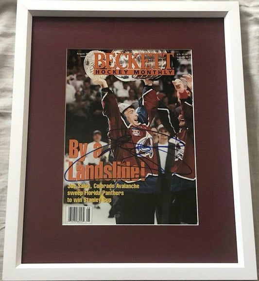 Joe Sakic signed Avalanche 1996 Stanley Cup Champions Beckett hockey cover framed JSA - AutographsForSale.com