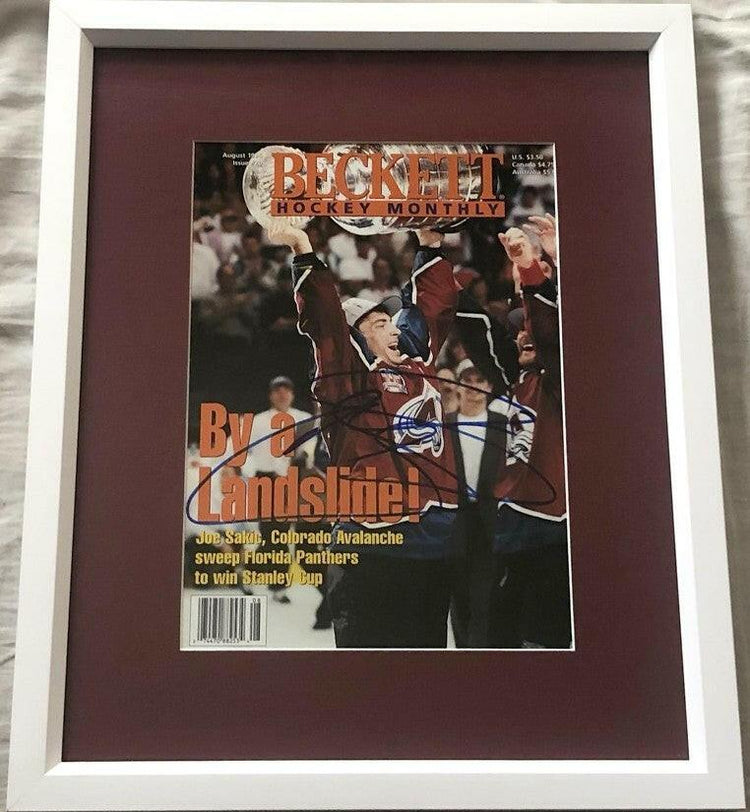 Joe Sakic signed Avalanche 1996 Stanley Cup Champions Beckett hockey cover framed JSA - AutographsForSale.com