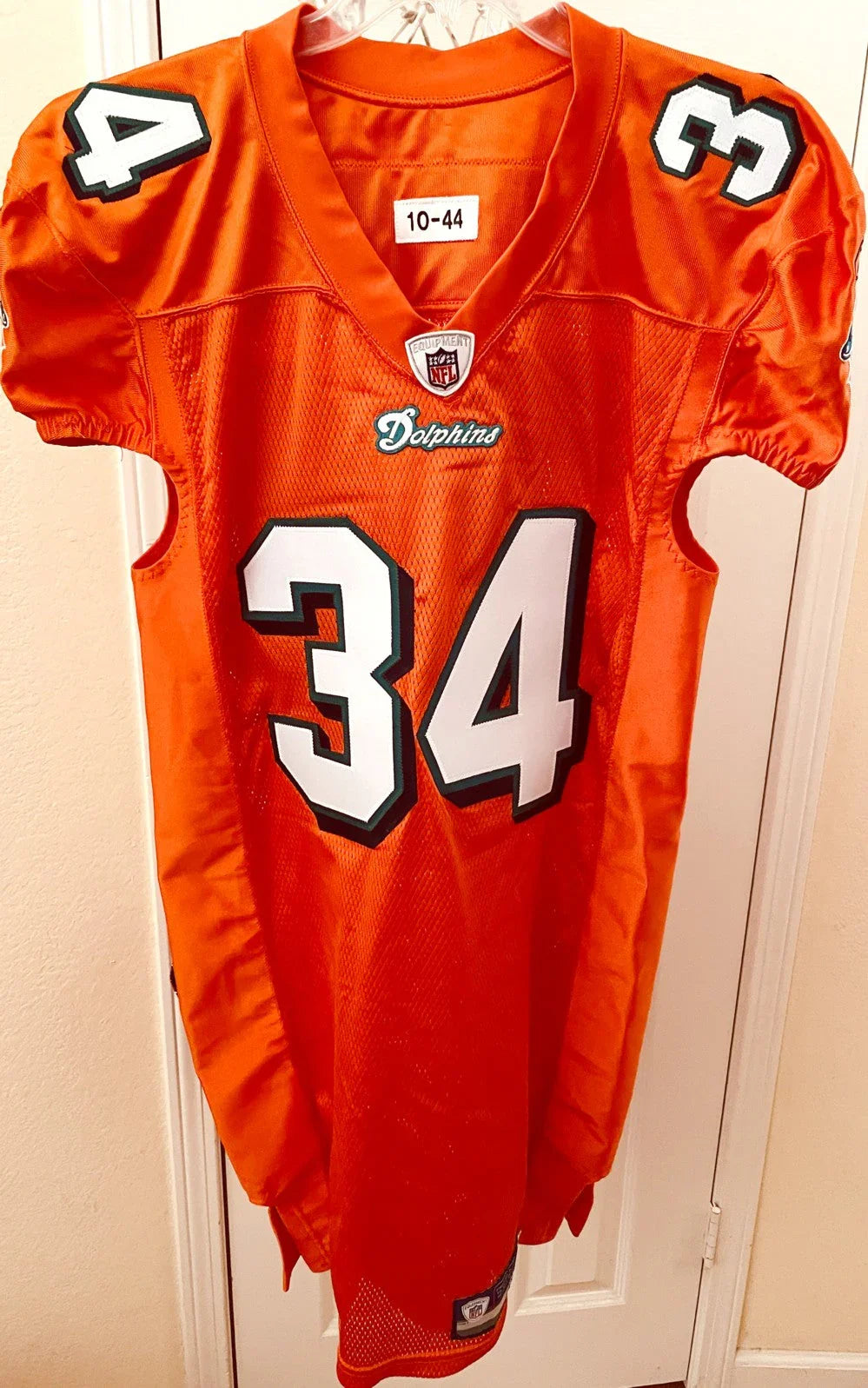 Ricky Williams Dolphins 2010 Reebok team issued orange jersey - AutographsForSale.com