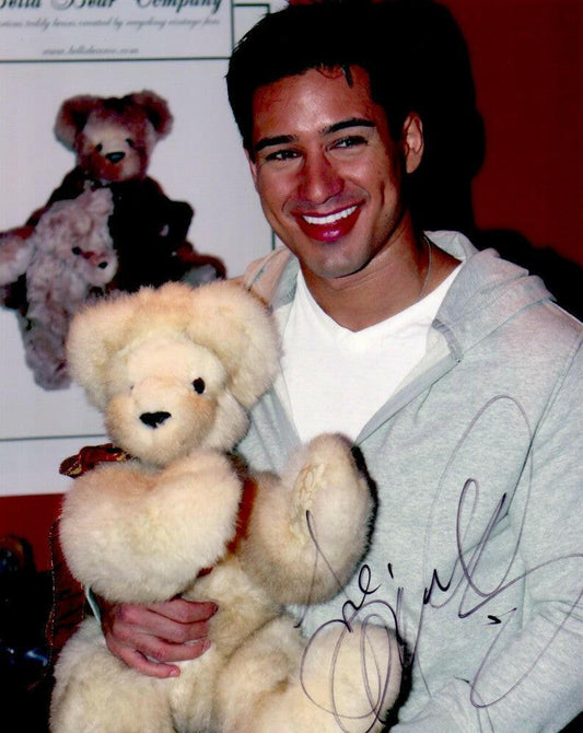 Mario Lopez signed 8x10 photo with teddy bear inscribed Love - AutographsForSale.com