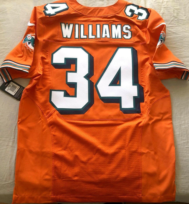 Ricky Williams Dolphins Nike Elite Orange game model jersey New - AutographsForSale.com