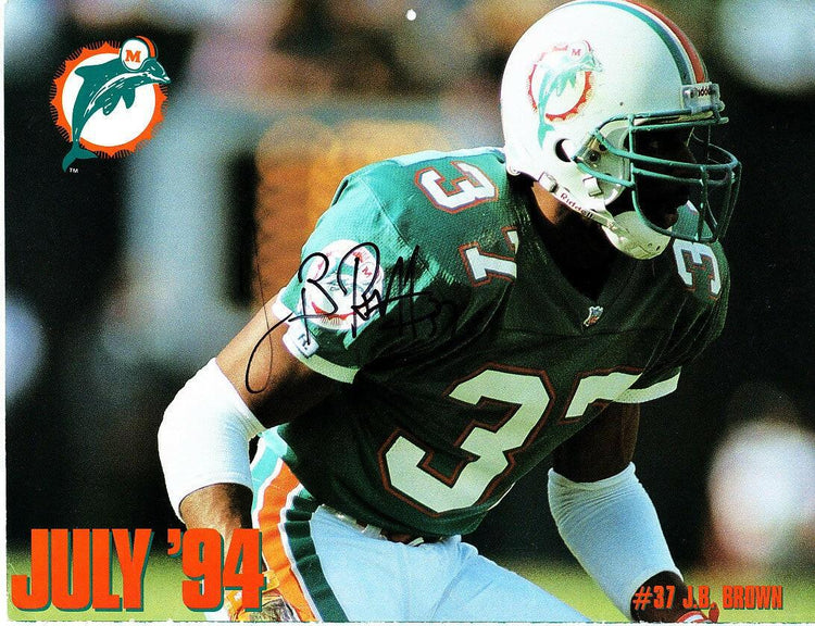 J.B. Brown signed Miami Dolphins 1993 1994 calendar photo - AutographsForSale.com