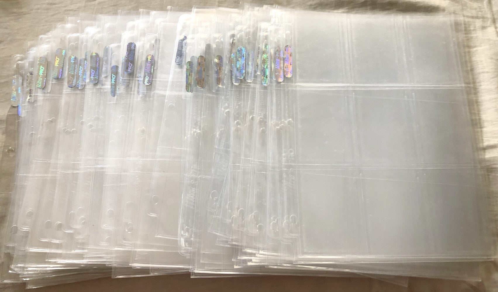 Lot of 16 Ultra Pro Platinum 9 pocket trading card storage sheets (gently used)