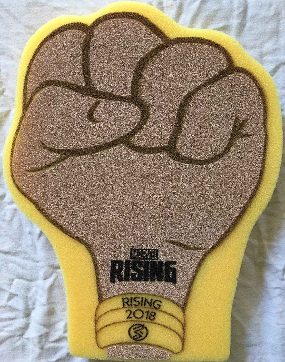 Marvel Rising and Ms. Marvel 2018 San Diego Comic-Con promo yellow foam fist