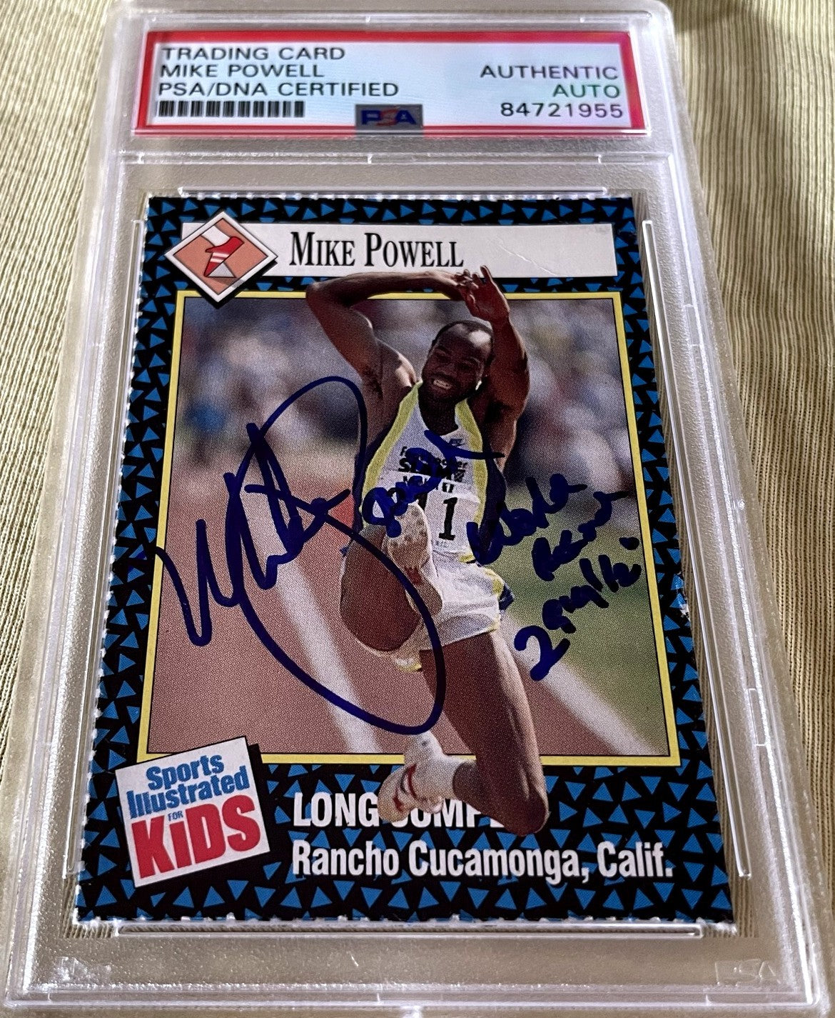 Mike Powell autographed 1992 Sports Illustrated for Kids Rookie Card inscribed World Record (PSA/DNA slabbed)